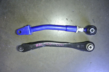Megan Racing MKV Supra Rear Front Lower Trailing Arms vs Stock