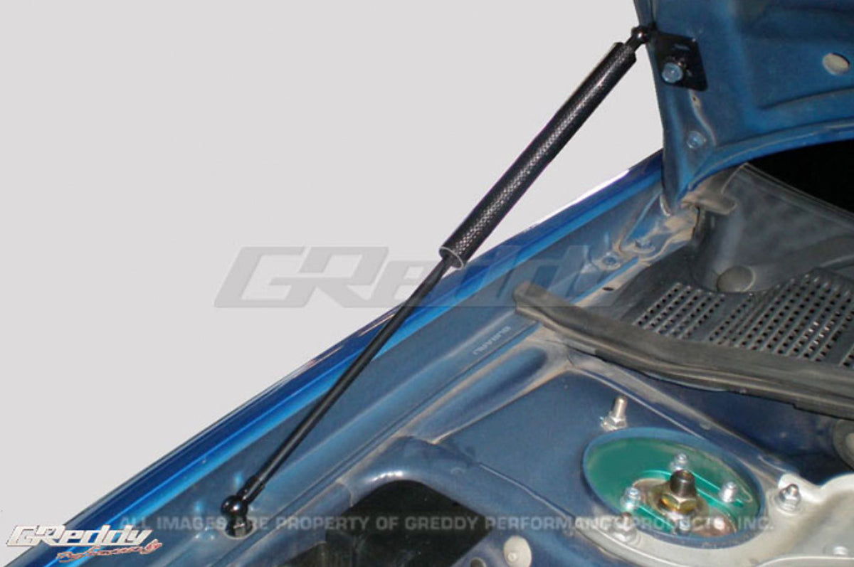 GReddy Carbon Fiber Hood Damper for 05-07 WRX/STi (18560101)