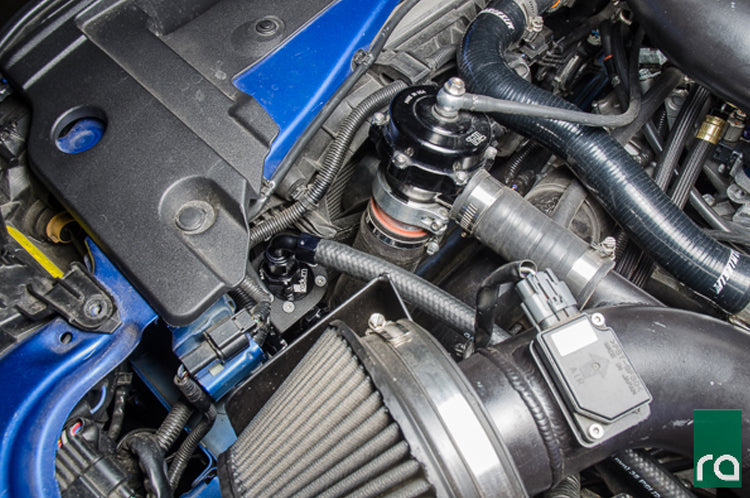 Radium Alternate LH Catchcan Mounting Bracket installed on a Evo X (20-0300)