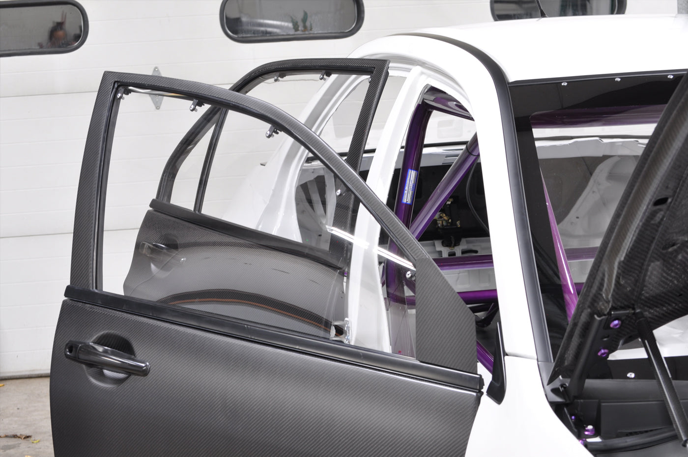 Seibon Carbon Fiber Front Doors for Evo 7/8/9 (DD0305MITEVO8-F)