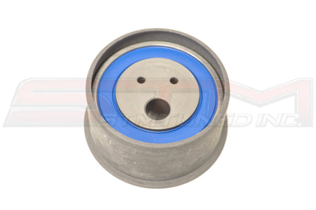 Mitsubishi OEM Timing Belt Tensioner Pulley for 2G DSM Image © STM Tuned Inc.  Part Number MD182537