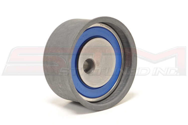 Mitsubishi OEM Timing Belt Tensioner Pulley for 2G DSM Image © STM Tuned Inc.  Part Number MD182537
