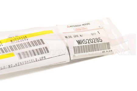 Mitsubishi OEM Windshield Window Upper Molding for Evo 7/8/9 (MR520285)  Image © STM Tuned Inc
