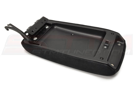 Mitsubishi OEM Suede Armrest for Evo 7/8/9 (MR633889)  Image © STM Tuned Inc