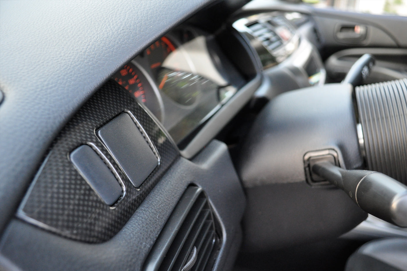 OEM Evo 9 Carbon Fiber Panels installed in an Evo RS with OEM "Blank Plugs" Installed