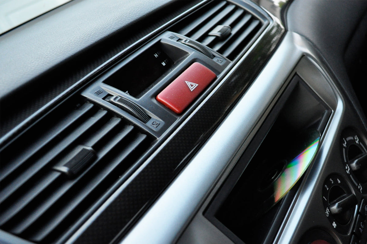 OEM Evo 9 Carbon Fiber Panels installed in an Evo RS with OEM Radio Pocket