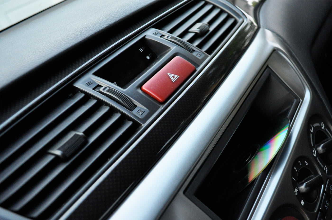 OEM Evo 9 Carbon Fiber Panels installed in an Evo RS with OEM Radio Pocket