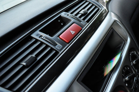 OEM Evo 9 Carbon Fiber Panels installed in an Evo RS with OEM Radio Pocket