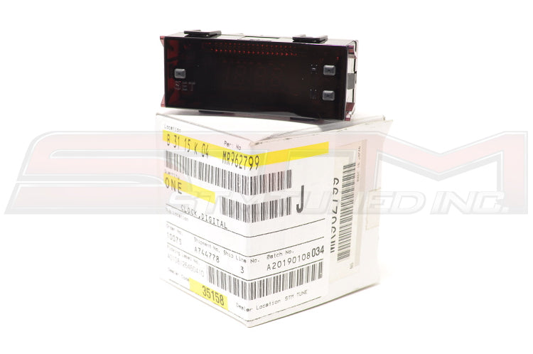 Mitsubishi OEM Dash Clock for Evo 7/8/9 MR962799 © STM Tuned Inc.