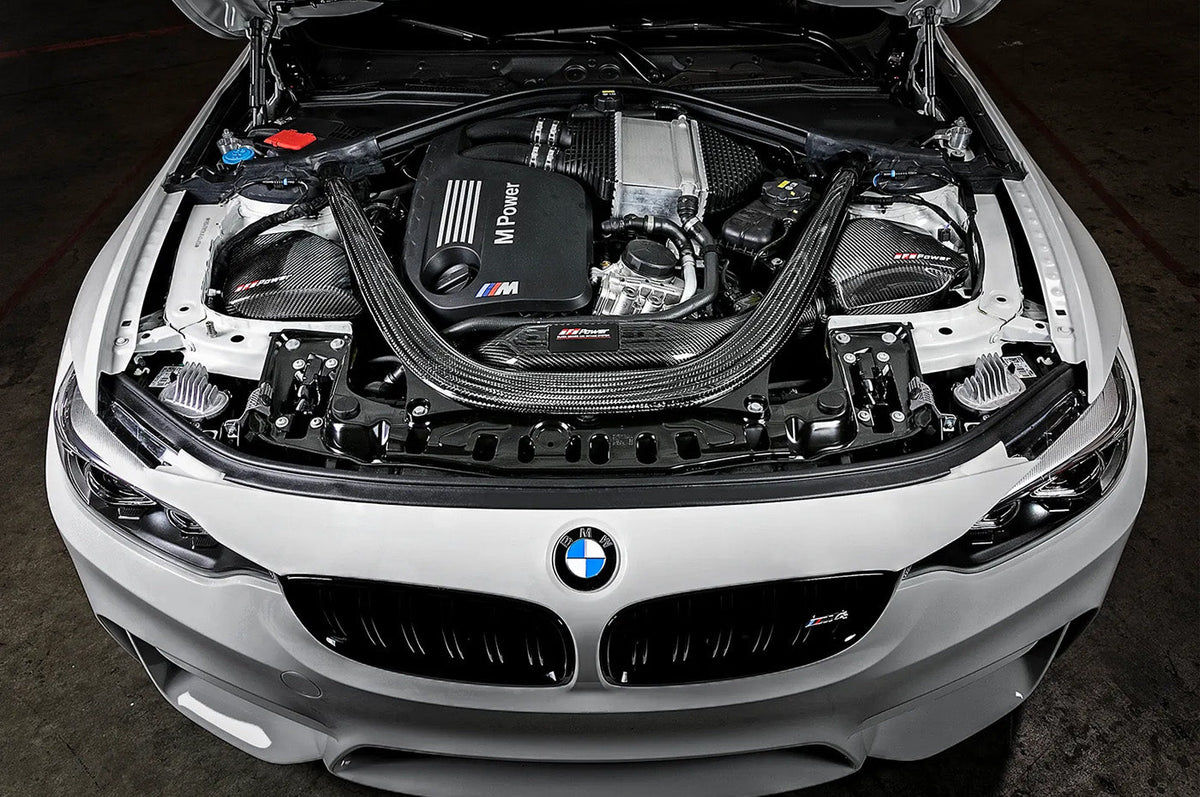 aFe Black Series Momentum Carbon Cold Air Intake for F8X BMW M2 Competition, M3, and M4 with S55 engine installed on M4