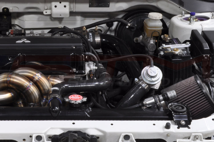 Silver Hallman Pro Boost Controller installed in an Evolution 8