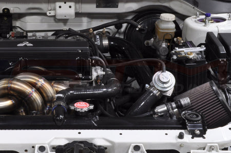 Silver Hallman Pro Boost Controller installed in an Evolution 8