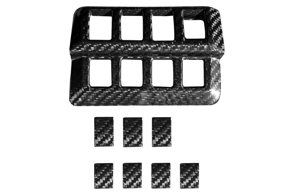 2022+ WRX Rexpeed carbon fiber left switch button panel surround trim and carbon fiber blank button covers. Retains an open space for the display brightness dimmer scroll, tailgate/ trunk switch, and traction control switch. Includes 3M tape for easy installation (G98) 