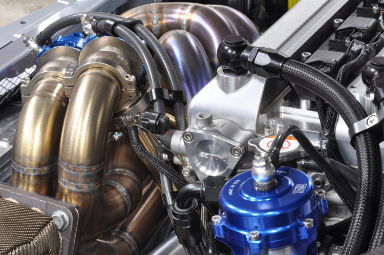 STM Evo Cam Position Sensor Housing Cover installed with billet valve cover