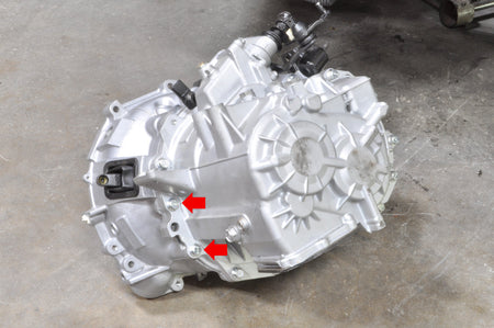 These two bolts will be reused to mount the catch can