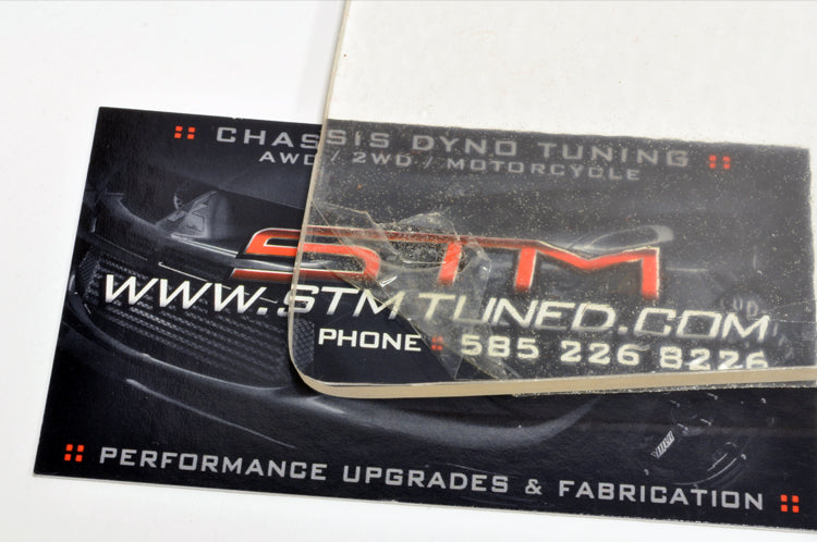 Lexan Window clear against a STM business card