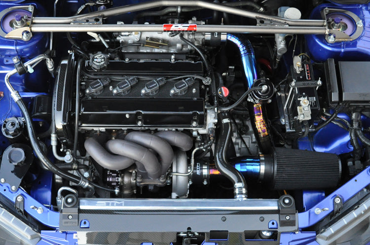 Evo 7 8 9 Stock Replacement Exhaust Manifold installed with black ceramic coating