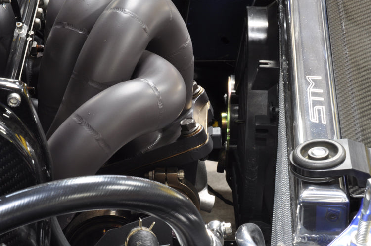 Evo 7 8 9 Stock Replacement Exhaust Manifold installed with black ceramic coating
