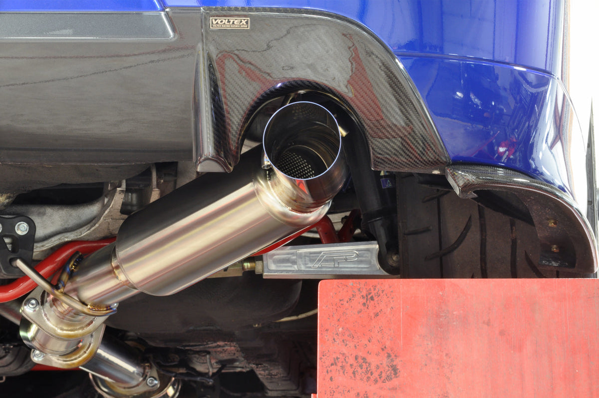 STM Titanium CatBack Exhaust Installed on a 2005 Electric Blue Evo 8 with JDM 9 Rear Bumper