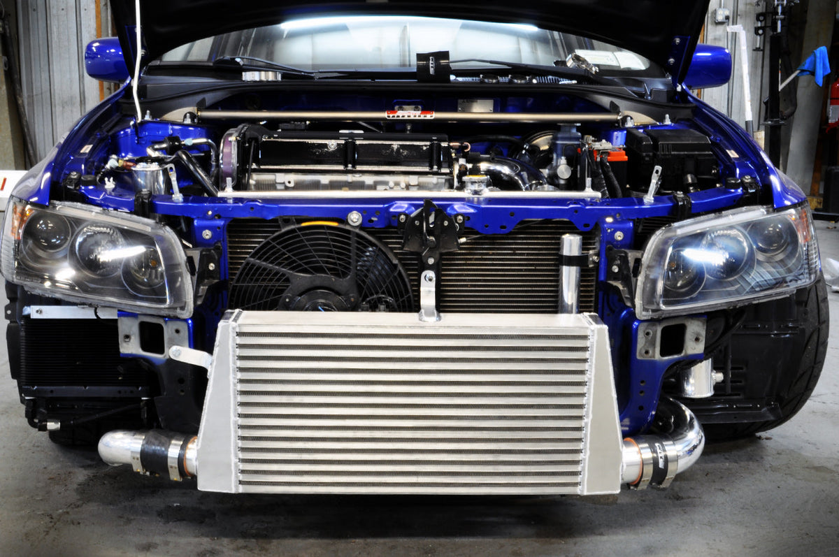 STM Evo 7/8/9 Lower Intercooler Pipe for Stock Frame Turbo Installed (Polished aluminum is pictured)