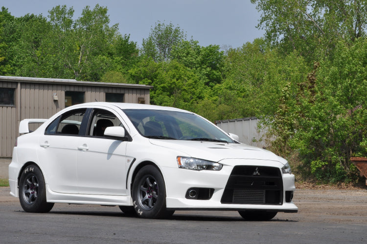 Evo X with drag wheels and slicks