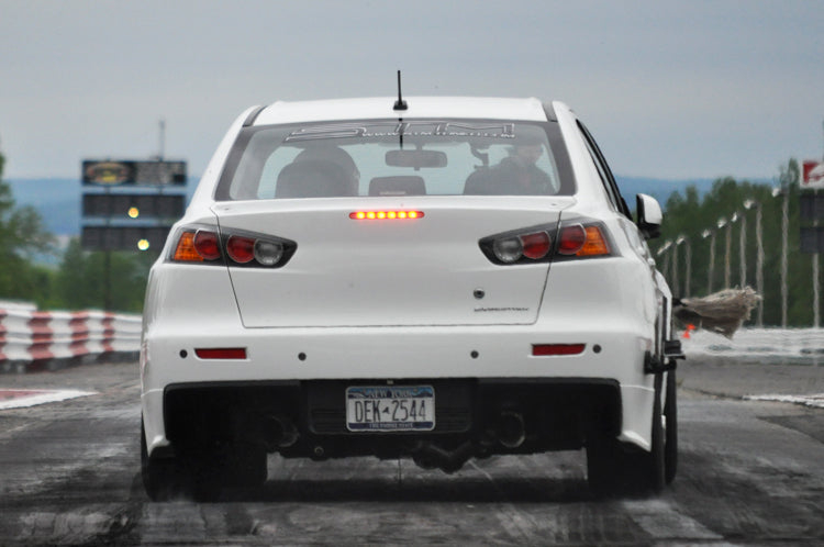 Evo X with drag wheels and slicks launching