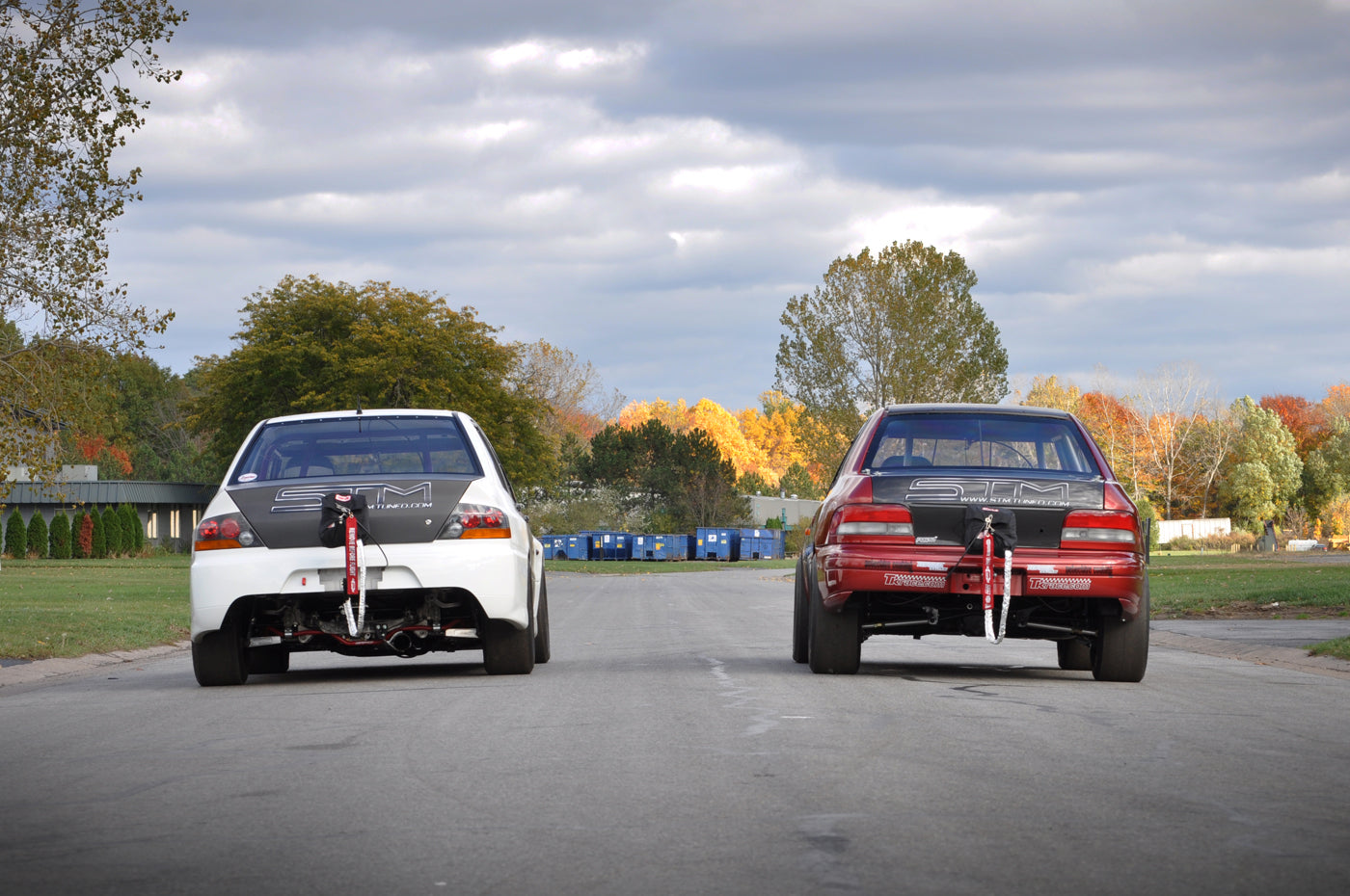 STM Window Banner on White Evo RS and Red Subaru RS