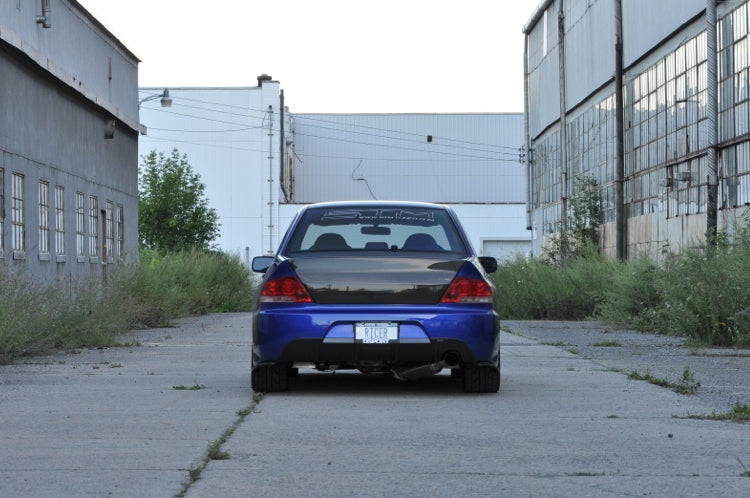Voltex Exhaust Shield Installed on an Electric Blue Evolution IX Rear Bumper